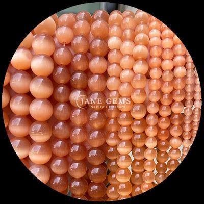 গোলাকার আকৃতির রত্ন মুক্তা রঙিন নীল সবুজ কমলা রঙের বিড়ালের চোখ